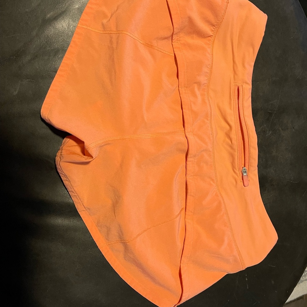 Lululemon Speed Up orange shorts 2.5 inch length